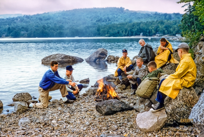 Photo showing: Popping Wet -- July 1955. Camp Sunapee, New Hampshire. Campers making popcorn on a rainy day at Pleasant Lake.