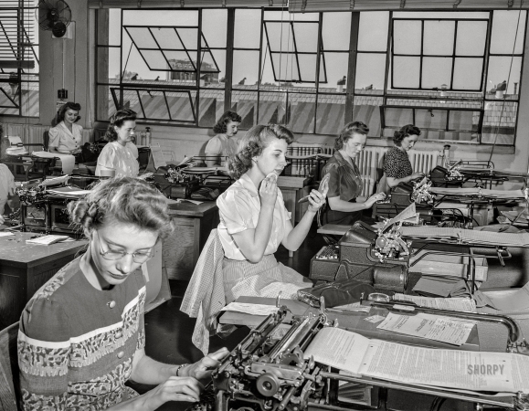 Photo showing: Chrysler Typists -- May 13, 1942. Detroit, Michigan. Chrysler Corporation office workers typing various forms.
