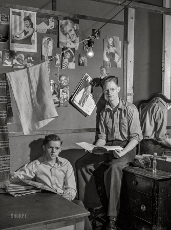 Photo showing: Study Buddies -- February 1943. Madison, Wisconsin. Gordon Swanstrom and Morell Babcock,
students in the farm short course at the University of Wisconsin.