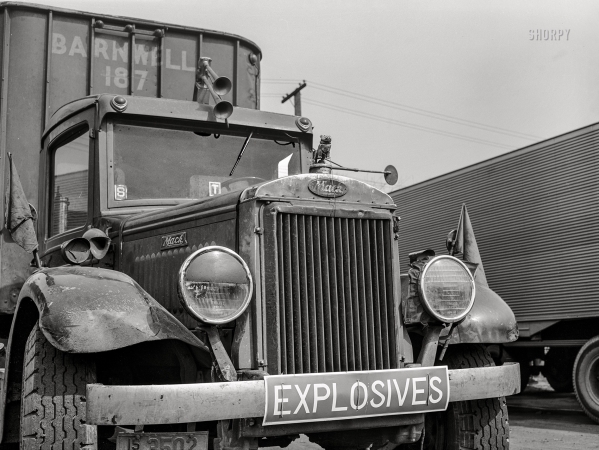 Photo showing: Mack Attack -- March 1943. Baltimore, Maryland. Associated Transport trucking terminal. Truck loaded with explosives.