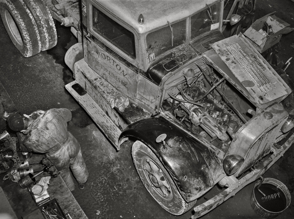 Photo showing: Engine Overhaul -- March 1943. Baltimore, Maryland. Associated Transport Company trucking terminal. Truck service shop.