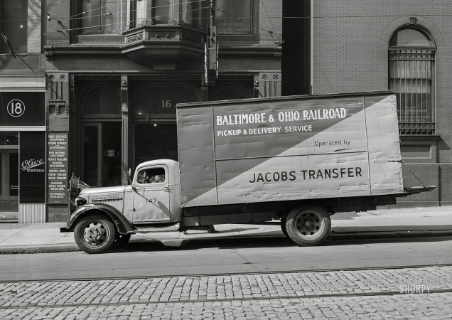 Photo showing: Jacobs Transfer -- April 1943. Baltimore, Maryland. A local delivery truck on South Howard Street.