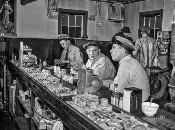 Photo showing: NO DANCING -- March 1943. Sam Bens and Noah Booher, drivers for Associated Transport Company ... 