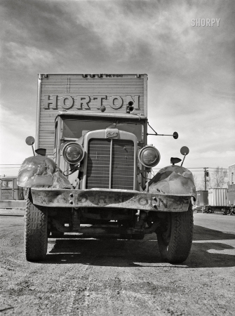 Photo showing: Horton Corbitt -- March 1943. Truck transportation from Baltimore to New Orleans. A truck and trailer in Baltimore.