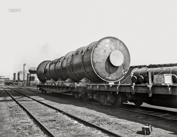 Photo showing: Sideways -- April 1943. Detroit, Michigan. A section of a boiler on a flatcar.