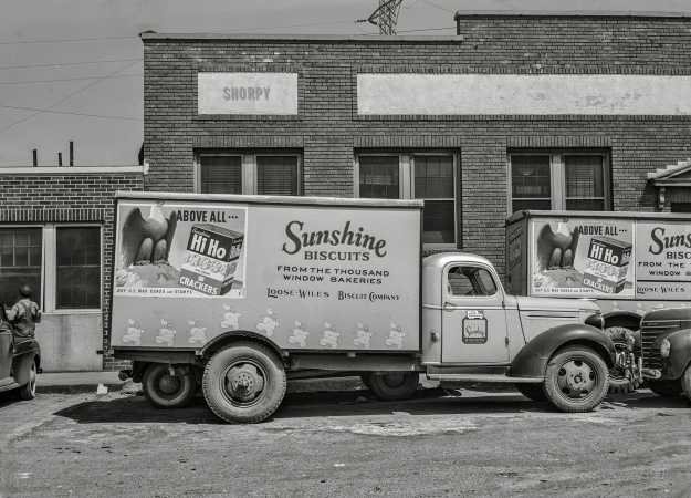 Photo showing: Hi Ho, Hi Ho -- March 1943. Charlotte, North Carolina. Sunshine Biscuit trucks.